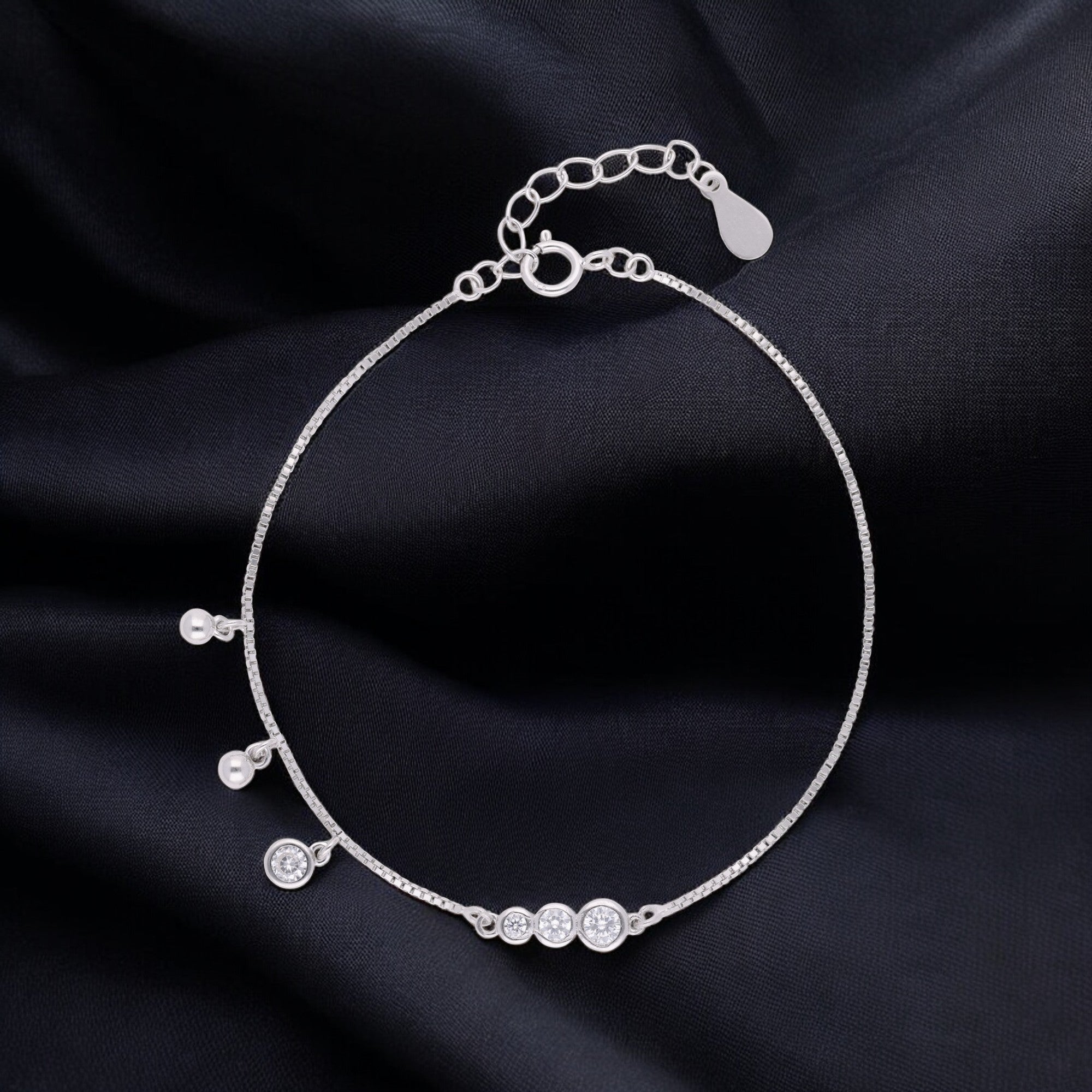 Raindrop Radiance Sterling Silver Bracelet – A Delicate Cascade of Light | SKU : 0021546495, 0021546501