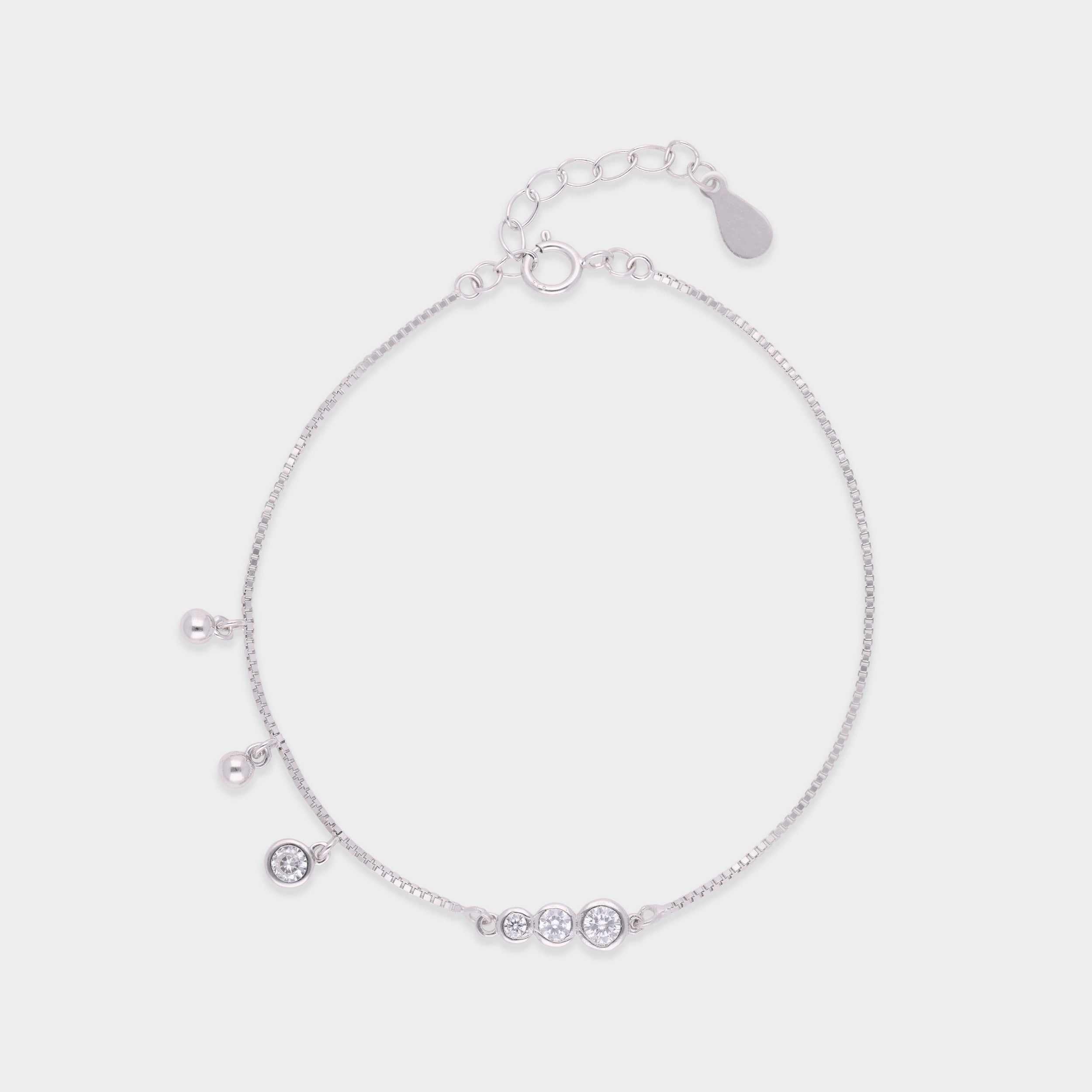 Raindrop Radiance Sterling Silver Bracelet – A Delicate Cascade of Light | SKU : 0021546495, 0021546501