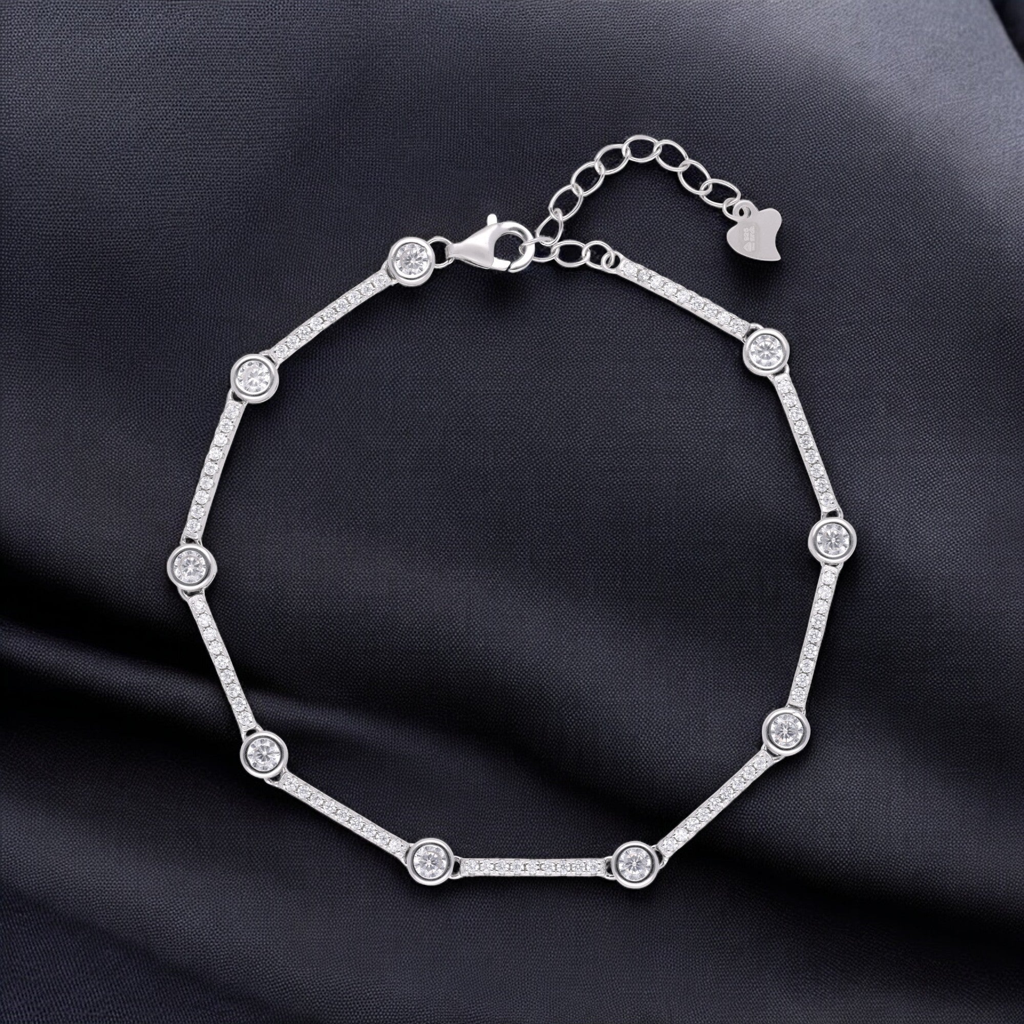 Silver-Toned Tennis-Inspired Bracelet with Bezel-Set Round Stones and Pavé Links | SKU : 0021546525, 0021546518