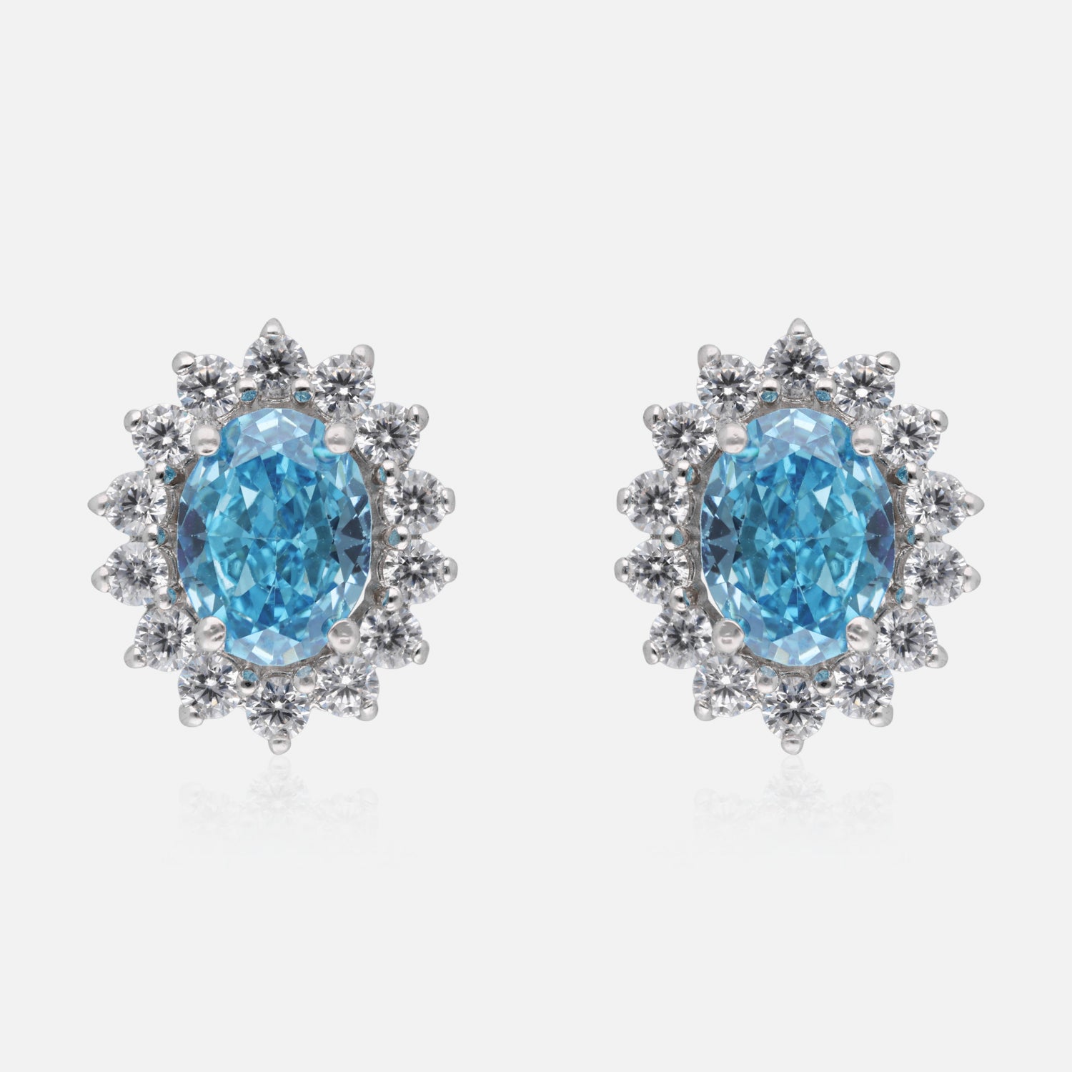 Elegant Sterling Silver Blue Topaz & Halo CZ Stud Earrings | SKU : 0022158642