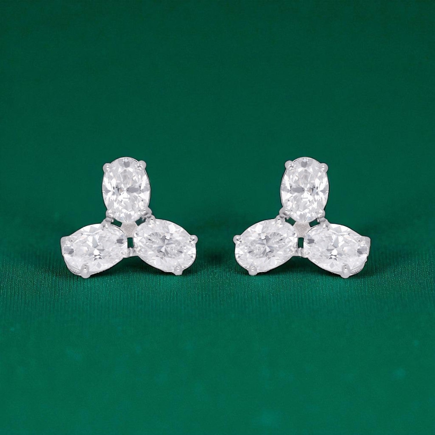 Trilight Elegance – Three-Stone Stud Earrings | SKU : 0022196064, 0022194671, 0003904428