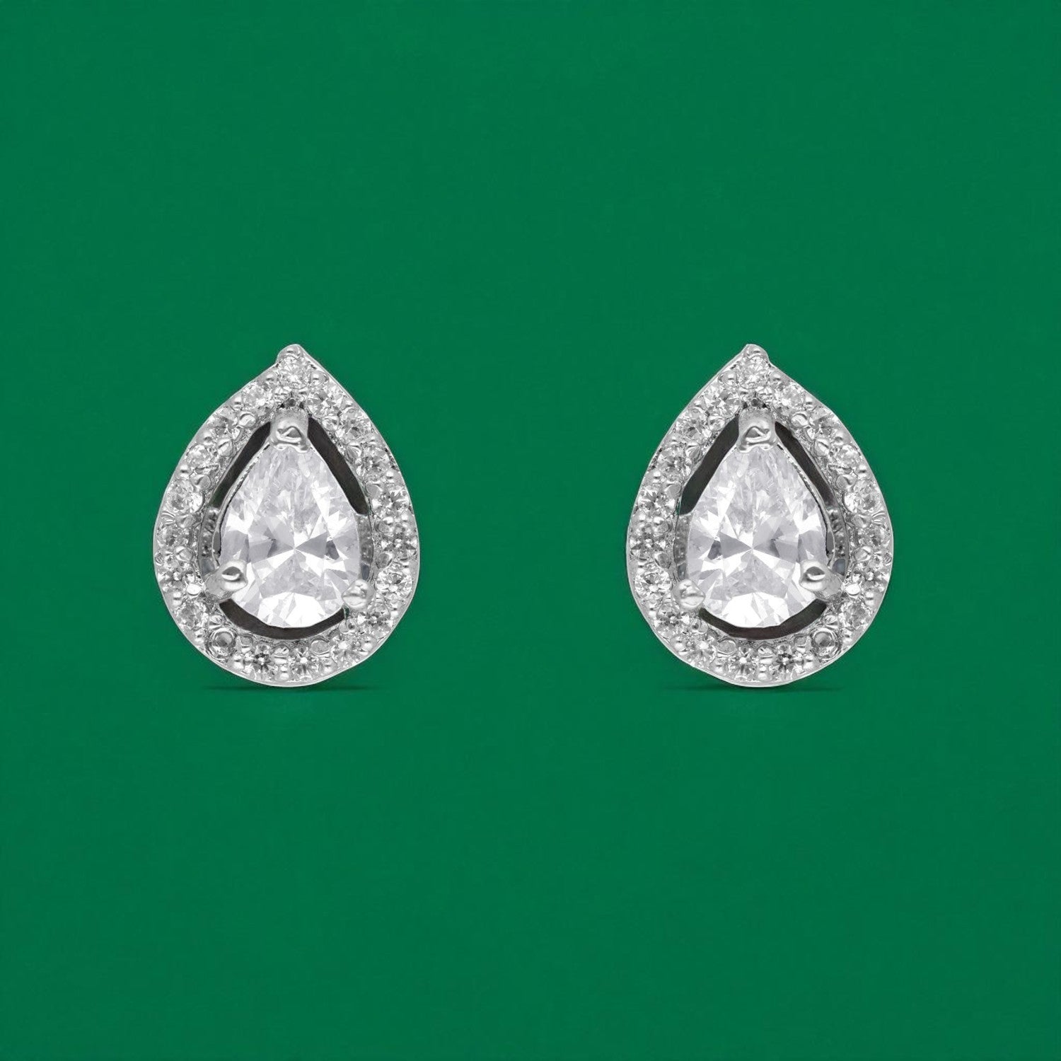 Radiant Grace – Teardrop Halo Cubic Zirconia Stud Earrings | SKU : 0022196149, 0022194756, 0003904503