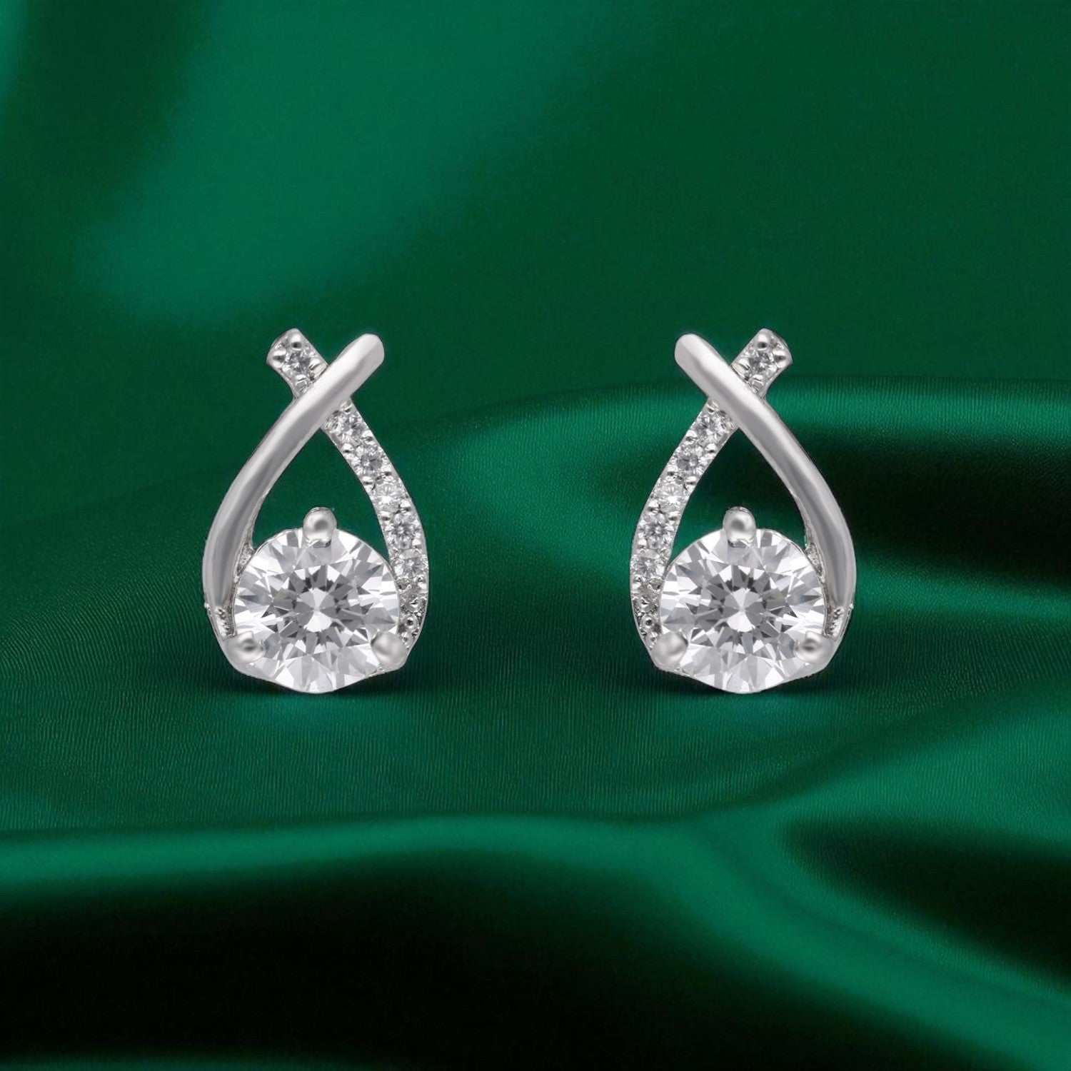 Infinity Glow – Twisted Drop Cubic Zirconia Stud Earrings | SKU : 0022196286, 0022194893, 0003904640