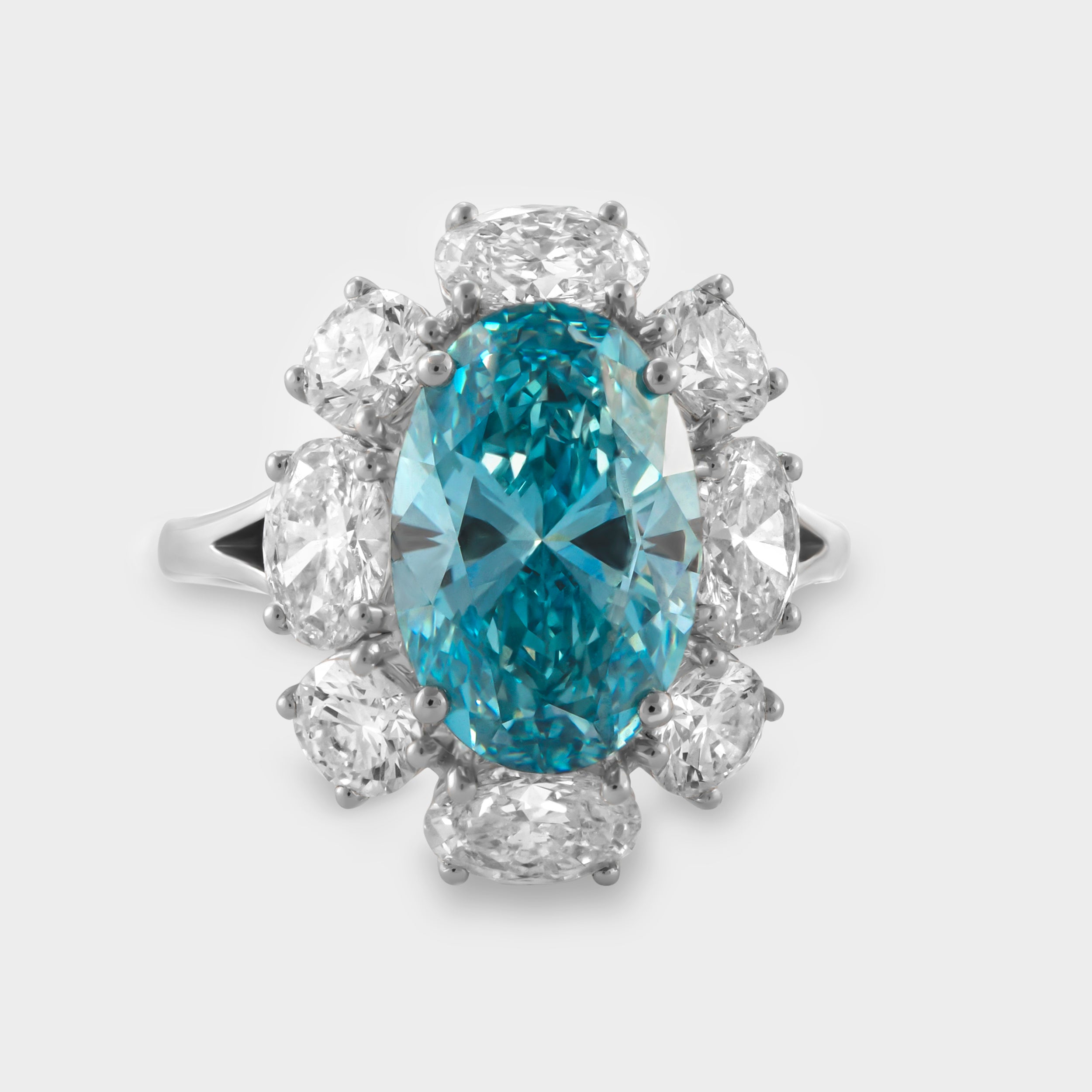 Azure Elegance: Oval-Cut Fancy Vivid Blue & White Diamond Ring | SKU:0019456140