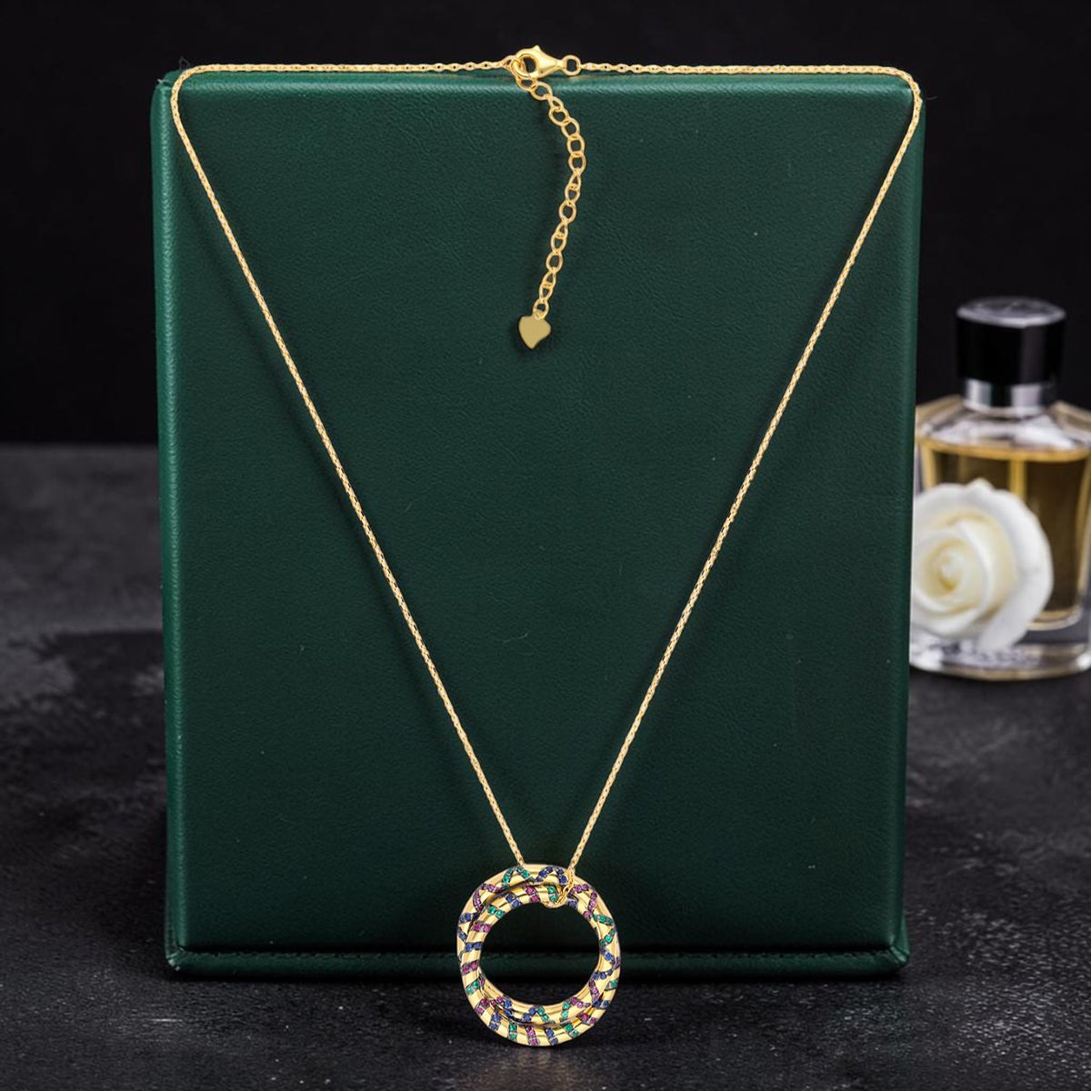Sterling silver circular pendant necklace with multicolour cubic zirconia and gold finish | SKU: 0006709396