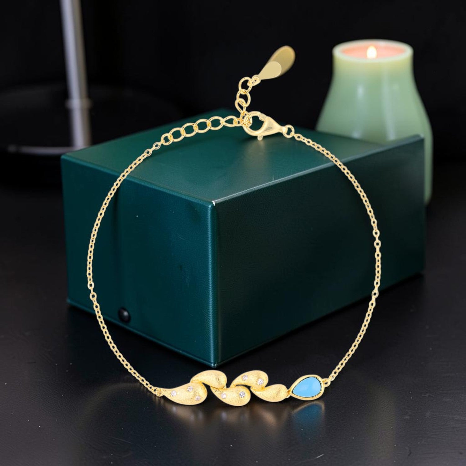 Sterling Silver Floral Charm Bracelet with Sky Blue Teardrop Stone | SKU: 0006714581
